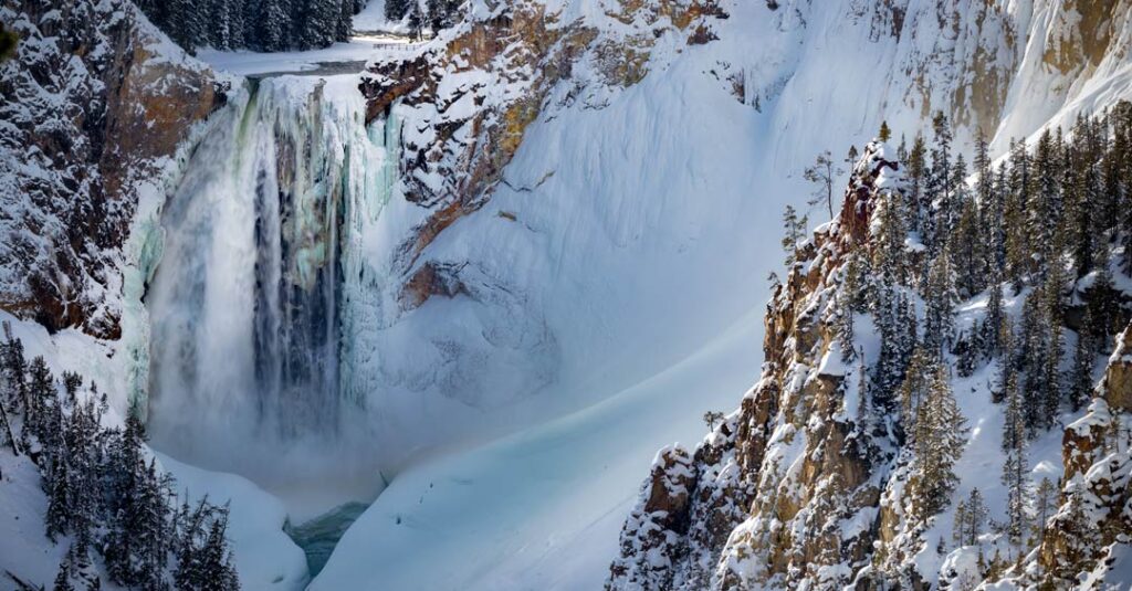 A frozen waterfall seen on a winter hike in Yellowstone National Park